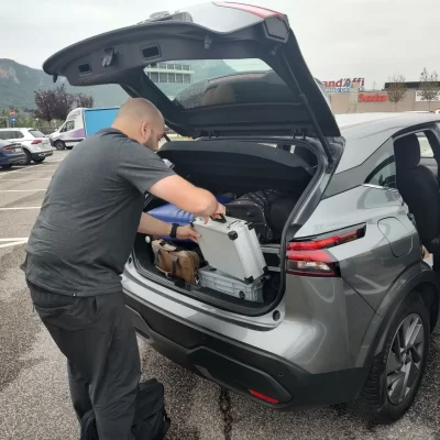 A man loading a car trunk